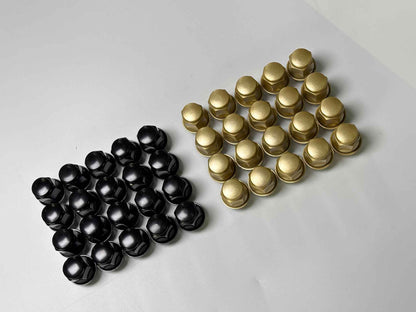 Black and gold forged lug nuts for Mustang Mach-E wheels, corrosion-resistant finish