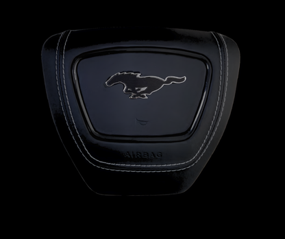 Ford Mustang Mach-E center airbag cover with premium leather, contrast stitching, and embossed logo