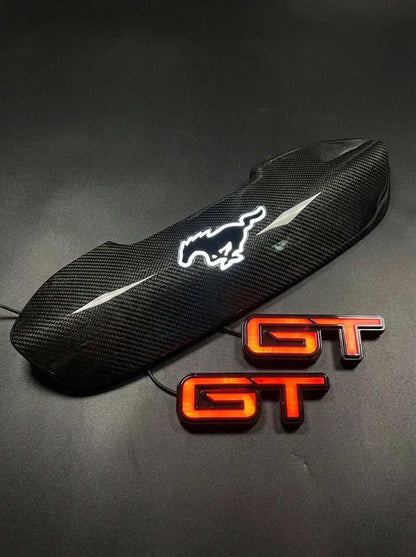 ULTIMATE UNTAMED PACKAGE Mustang Mach-E 2026 front grille upgrade with chrome pony emblem and GT light